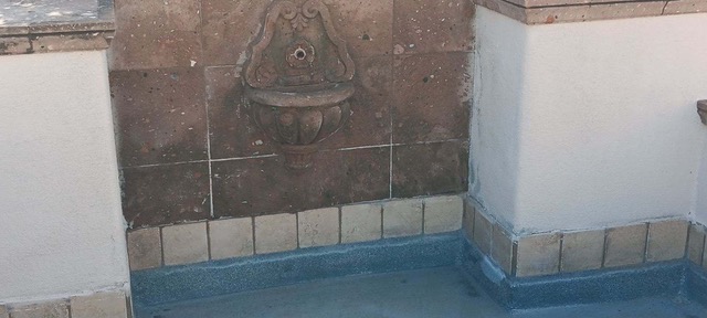 Tiled fountain restoration after detail work